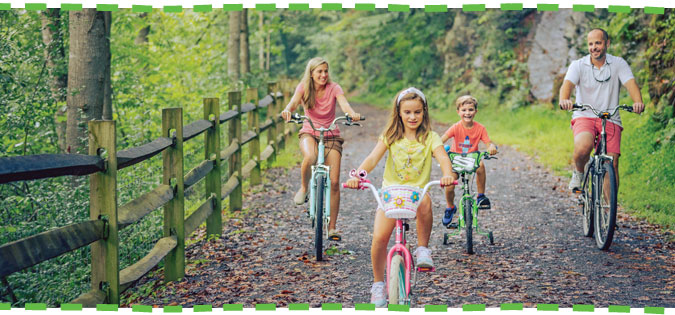 family biking the Jackson River Scenic Trail